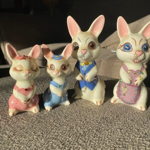 Set of 4 ceramic bunny figurines