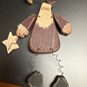 Wood Santa ornament with moveable arms and legs
