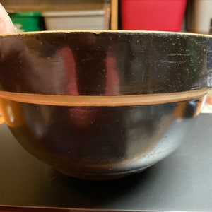 Yellow ware bowl with brown glaze