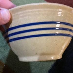 Antique yellow ware bowl with blue stripes