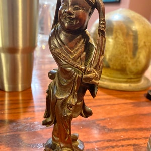 Carved wood figure of Buddha?