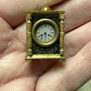 Miniature dollhouse sized gold carriage clock