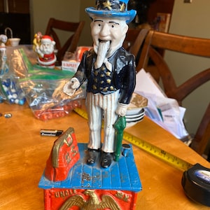 Vintage cast iron Uncle Sam bank
