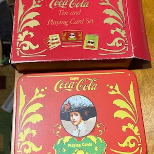 Old fashioned Coca Cola playing cards in tin