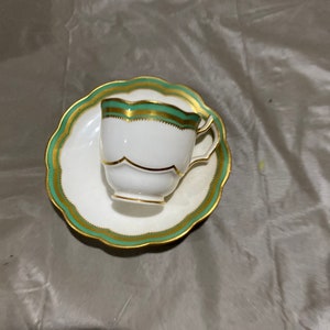 Antique Anglo China of England teacup and saucer set.
