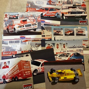Collection of ford motor sports racing advertisements