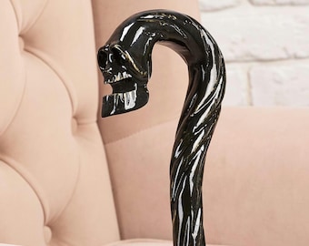 Carved wooden walking cane with mistic skull
