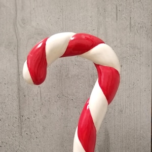 Handgemaakte gesneden houten wandelstok: ontwerp kerstlolly