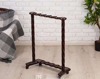 Suporte de madeira entalhada para bengala: elegante porta-bengala.