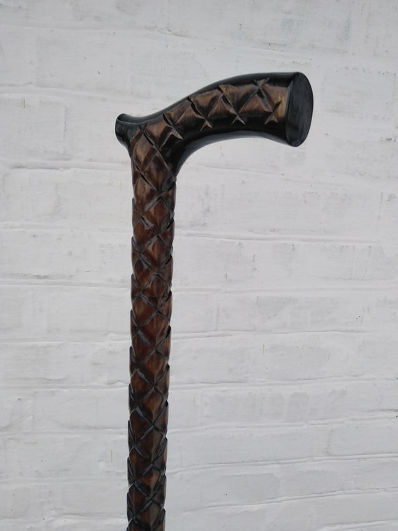 Bastone da passeggo n legno a forma d rana