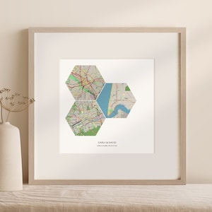 May include: A framed print with a white background featuring a map of a city divided into hexagonal shapes. The text "Carly & David" and "Home is wherever I am with you" is printed below the map.