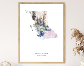 May include: A watercolor print of the outline of British Columbia, Canada, with a forest scene inside the outline. The print has a light pink, blue, and green color scheme. The text "BRITISH COLUMBIA 53.7267° N, 127.6476° W" is at the bottom of the print.