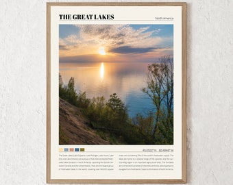 May include: A framed print of a sunset over a lake with the text "The Great Lakes" and "North America" at the top. The text "45.0522°N 82.4846°W" is in the bottom right corner. The print includes a description of the Great Lakes, their location, and their importance to the region.