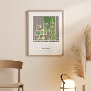 May include: A framed print of a campus map with the text "CLASS OF 2010" and "UNIVERSITY OF MILWAUKEE - WISCONSIN". The map is in shades of brown, green, and yellow.