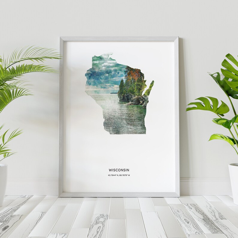 May include: A framed print of the state of Wisconsin with a watercolor-style image of a lake and trees. The print includes the state name and coordinates: "WISCONSIN 43.7844&deg; N, 88.7879&deg; W".