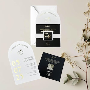 May include: A white wedding invitation with gold lettering. The invitation features a gold arch with the words "Wedding Invitation" and a gold ring design. The date of the wedding is listed as 05.07.25. The names Charlotte & Richard are listed below the date. The invitation also includes the time, location, and RSVP information.
