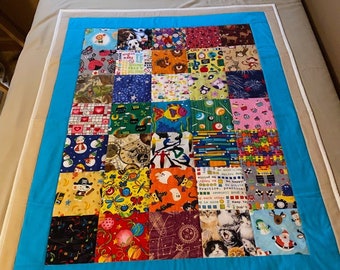 Customized I Spy Quilt 33" x 42" -- Comes with Personalized Multi-Game Booklet; Grows with Your Youngest Family Members