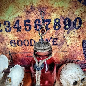 Antique apothecary bottle with decorative topper