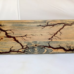 Decorative wall hanging wood panel with Lichtenberg figures and epoxy resin. Lodge loft style  decor for home, cafe, restaurant, office