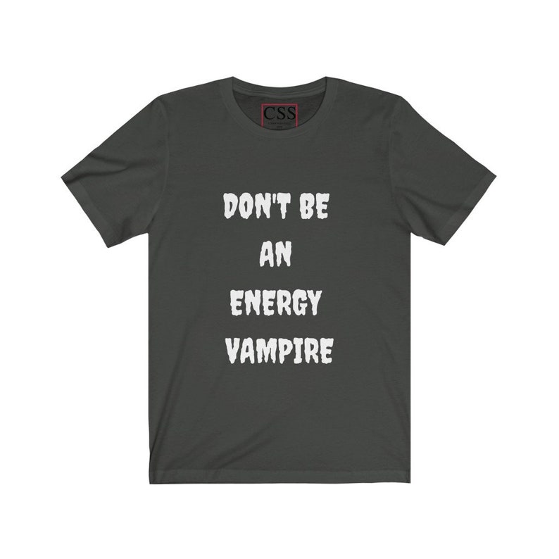 May include: Dark gray t-shirt with white text that reads "Don't be an energy vampire".