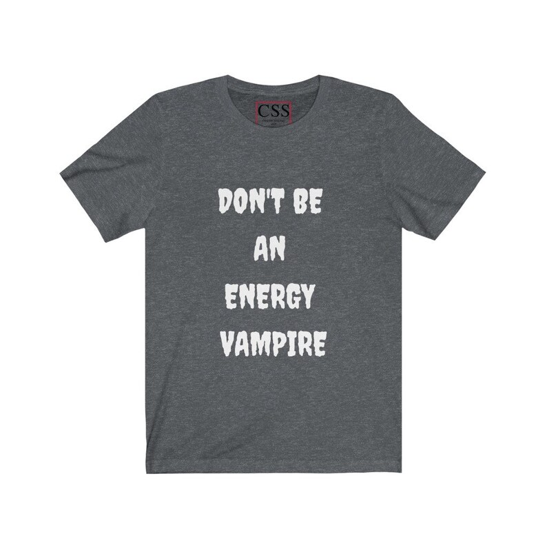 May include: A dark heather grey t-shirt with the text "Don't be an energy vampire" printed in white.