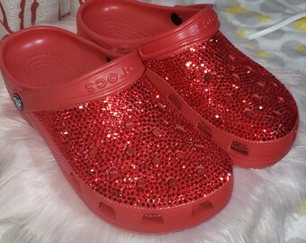 red sparkly crocs