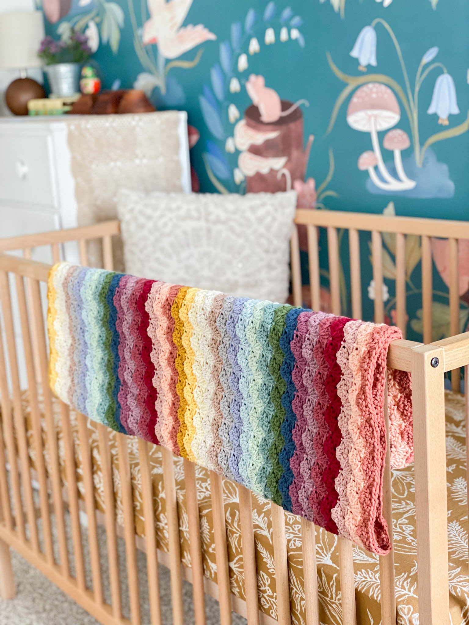 30 Rainbow Blanket Crochet Patterns to Brighten Baby Rooms, Throws, and Gift Giving 33 The Hope Rainbow Blanket Pattern