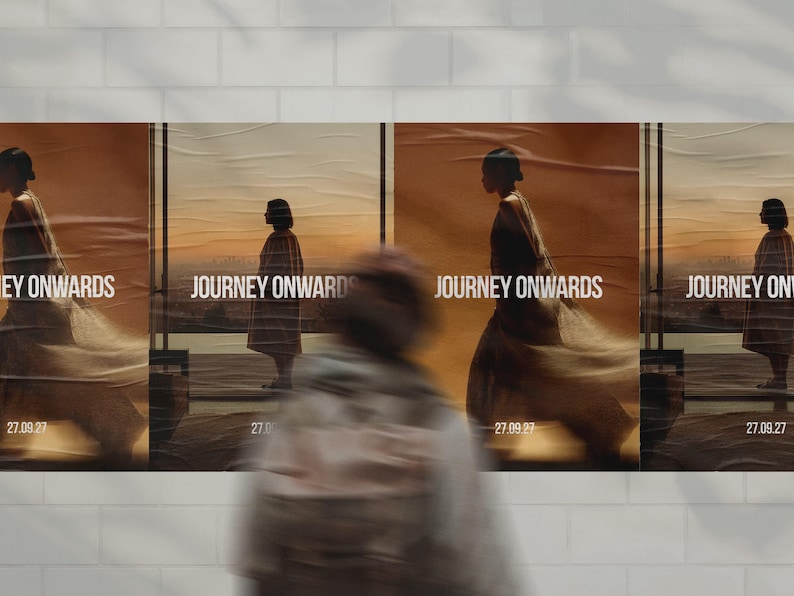 May include: Four posters with the text "JOURNEY ONWARDS" and the date "27.09.27". Each poster features a silhouette of a person walking, set against a warm, sunset-like background. The posters are displayed on a white brick wall.
