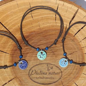 Cotton bracelet with ceramic pendant migratory birds in turquoise, light blue or dark blue