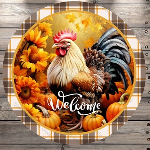 May include: A round welcome sign with a brown and white plaid background. A rooster stands in a field of sunflowers and pumpkins with the word "Welcome" written in white cursive.