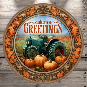 May include: A round, wooden sign with a decorative frame featuring autumn leaves. The center of the sign features a vintage tractor driving through a field of pumpkins. The text "autumn greetings" is written in a decorative font.