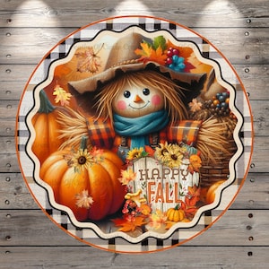 May include: A round, black and white checkered sign with a scarecrow wearing a plaid shirt and a blue scarf. The scarecrow is holding a sign that says "Happy Fall" and is surrounded by pumpkins, gourds, and fall leaves.