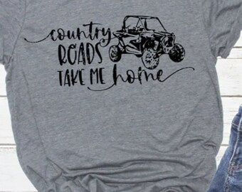 May include: Gray t-shirt with a black graphic of an off-road vehicle and the text "country roads take me home".