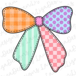 May include: A colorful patchwork bow with a pink center. The bow is made of orange and white gingham, pink and white checkered, light blue and white striped, and purple with white polka dots.