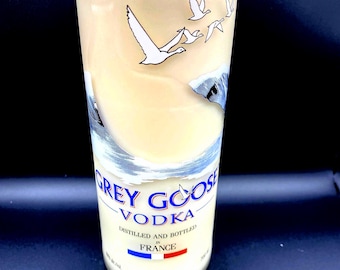 Upcycled Grey Goose* Vodka bottle crafted into a soy wax candle. Fragranced with vanilla.