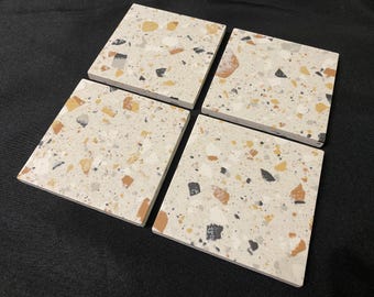 A set of four handcut Porcelain Venice Ivory Terrazzo Coasters.