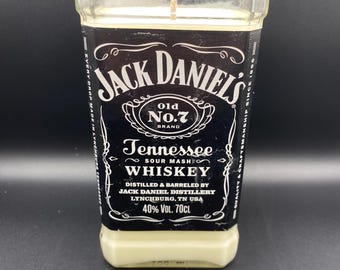 Upcycled Jack Daniels* bottle crafted into a soy wax candle. Fragranced with whiskey.