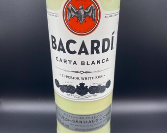 Upcycled Bacardi* bottle handcut and crafted into a soy wax candle. Fragranced with vanilla.
