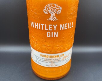 Upcycled Whitley Neill Orange Bottle Candle: Handcut Soy Wax. Orange scent.