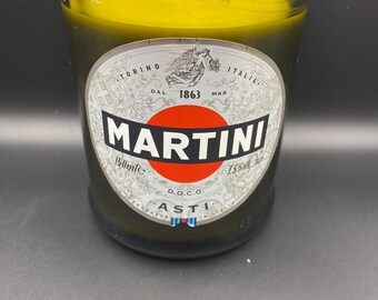 Upcycled Asti* bottle crafted into a soy wax candle. Fragranced with lavender & vanilla.