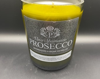 Upcycled Prosecco* bottle crafted into a soy wax candle. Fragranced with strawberries & cream.