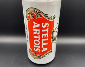 Upcycled Stella Artois* Can handcut and crafted into a soy wax candle. Fragranced with Vanilla