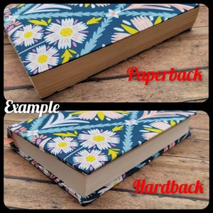 May include: Example of a paperback and hardback book with a floral design cover. The cover is blue with pink and yellow flowers. The text "Paperback" and "Hardback" is visible.