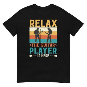 Relax The Guitar Player Is Here T-Shirt | Funny Musician Tee for Guitarists | Gildan 64000 Softstyle Band Shirt | Retro Guitar Shirt