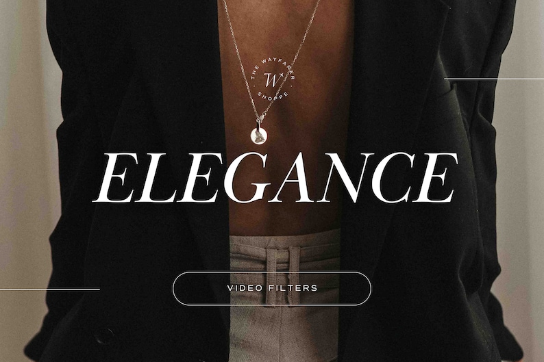 May include: A person wearing a black blazer with a silver necklace that has a pendant with the text "The Wayfarer Shoppe" and the letters "TW". The text "Elegance" is displayed in white letters on a black background. A white button with the text "Video Filters" is displayed below the text.