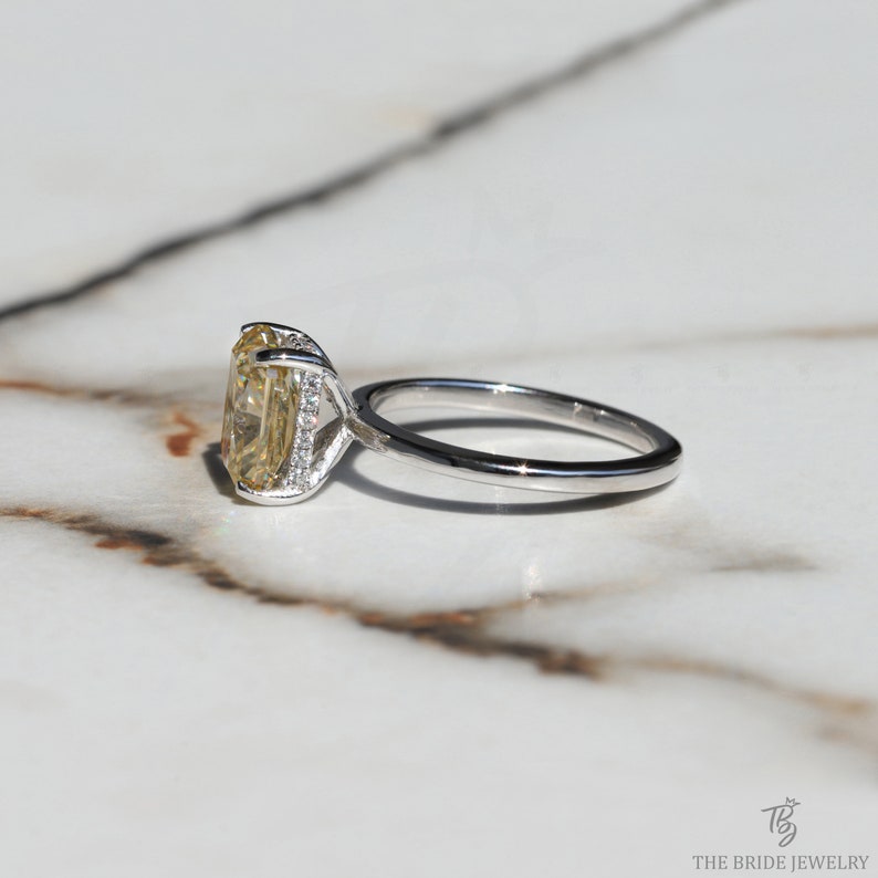 Classic oval ring,
Radiant engagement ring,
Radiant moissanite ring