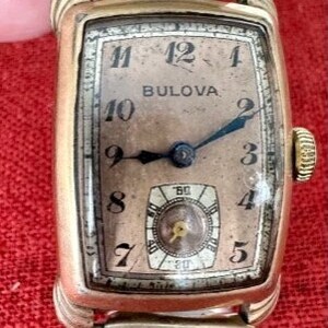 Bulova rectangle watch discount
