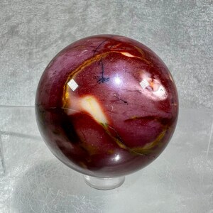 High Quality Mookaite Crystal Sphere. Stunning Shades Of Purple And Lavender. Fantastic Looking Crystal Sphere.