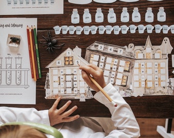 May include: A child is working on a math activity with two haunted house-themed game boards. The game boards have numbers and math symbols on them. The child is using a pencil to write on the boards. The game boards are on a wooden table.