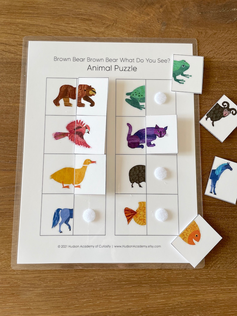 May include: A brown bear, a frog, a bird, a cat, a duck, a hedgehog, a horse, and a fish are pictured on a white background. The animals are part of a matching game for children. The text "Brown Bear Brown Bear What Do You See? Animal Puzzle" is at the top of the page.